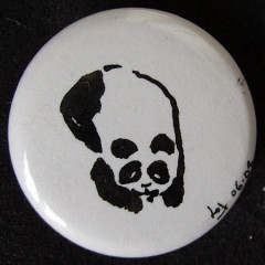 Badge Panda couché