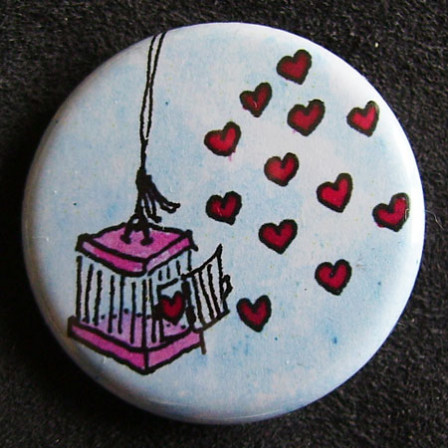 Badge « Les Amoureux » Cage aux Papillons