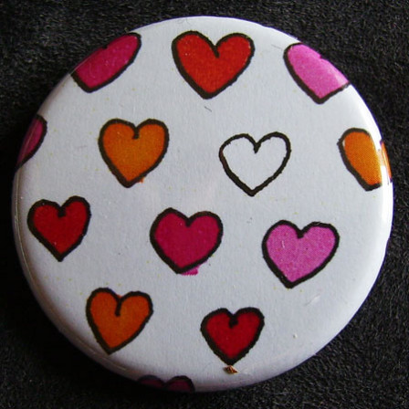 Badge « Les Amoureux »  Coeurs de Filles