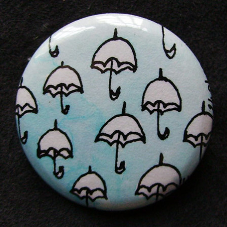 Badge Parapluies Ciel